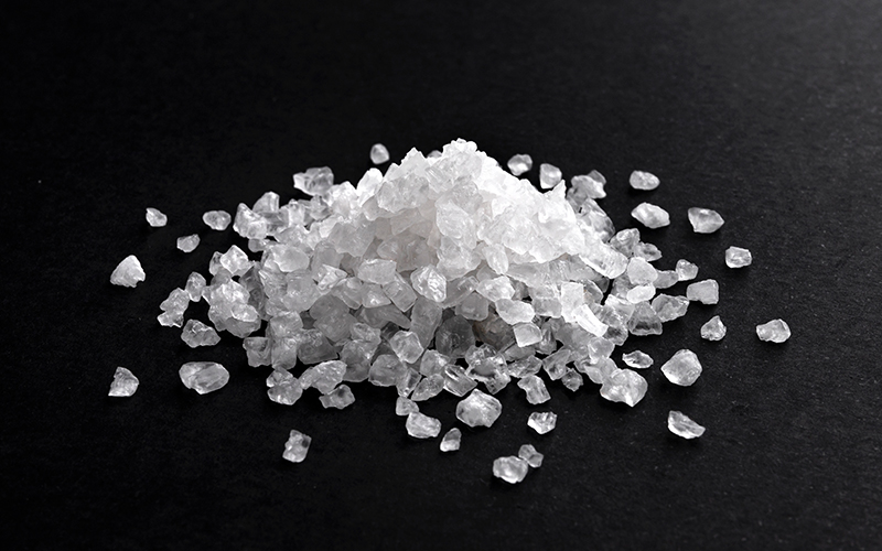 Ammonium nitrate nitrogen fertilizer granules close up