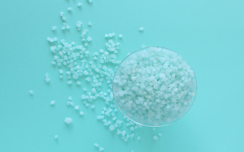 Water soluble fertilizer crystals overhead flat lay